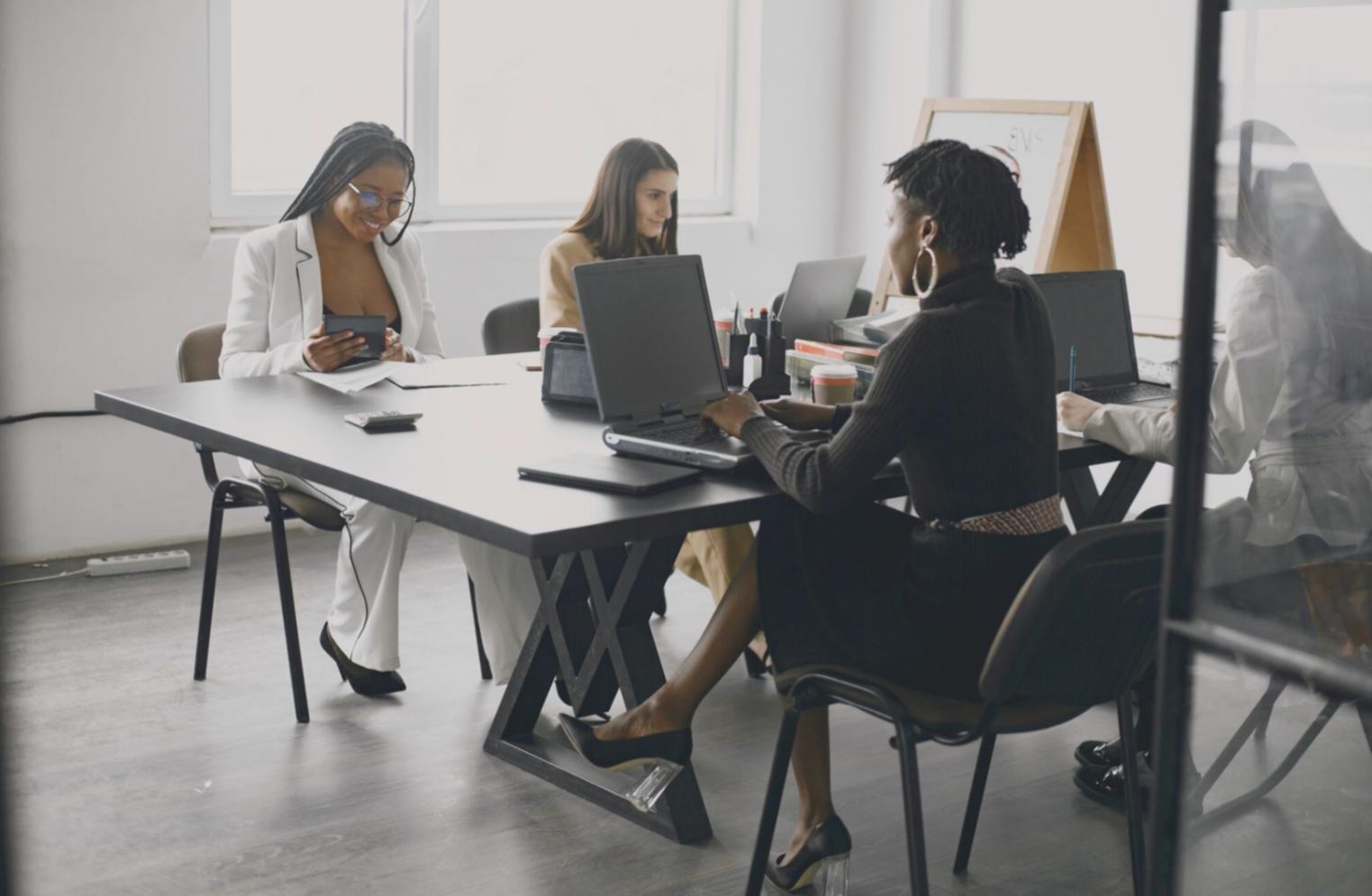 Professional partnership meeting with financial analysis documents